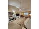 Living room features a comfy sofa and built-in shelving at 4632 Red Maple Rd # 1204, Bradenton, FL 34210
