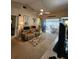 Spacious living room with a view of the enclosed patio at 4632 Red Maple Rd # 1204, Bradenton, FL 34210