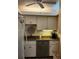 Galley kitchen with granite countertops and stainless steel appliances at 4632 Red Maple Rd # 1204, Bradenton, FL 34210