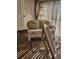 Sunroom features wicker loveseat and tiled floor at 4632 Red Maple Rd # 1204, Bradenton, FL 34210