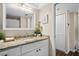 Well-lit bathroom with granite countertop and stylish decor at 4715 Bay Ne St # 223, St Petersburg, FL 33703