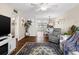 Living room with hardwood floors, comfortable furniture, and open floor plan at 4715 Bay Ne St # 223, St Petersburg, FL 33703