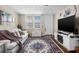Living room with hardwood floors, comfortable furniture, and open floor plan at 4715 Bay Ne St # 223, St Petersburg, FL 33703