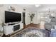 Living room with hardwood floors, fireplace, and open floor plan at 4715 Bay Ne St # 223, St Petersburg, FL 33703