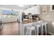 Modern kitchen with white cabinets, granite countertops, and stainless steel appliances at 4715 Bay Ne St # 223, St Petersburg, FL 33703