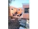 Cozy backyard patio area with brick pavers and lounge seating at 552 Trade Winds Dr, Dunedin, FL 34698