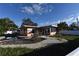 Inviting pool area with patio furniture at 552 Trade Winds Dr, Dunedin, FL 34698