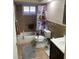 Clean bathroom with shower/tub combo and grab bars at 8906 Windsong Ln, Port Richey, FL 34668