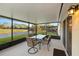 Screened patio overlooking a pond and golf course at 10306 Chatuge Dr, San Antonio, FL 33576