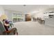 Spacious living area with open floor plan and view of patio at 10306 Chatuge Dr, San Antonio, FL 33576