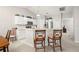 Bright kitchen with stainless steel appliances and an island at 10306 Chatuge Dr, San Antonio, FL 33576