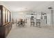 Bright dining area with hardwood table and chairs at 10306 Chatuge Dr, San Antonio, FL 33576