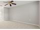 Bright bedroom with ceiling fan and neutral wall colors at 10306 Chatuge Dr, San Antonio, FL 33576