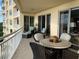 Large balcony with outdoor dining area and ocean views at 1200 Gulf Blvd # 503, Clearwater Beach, FL 33767