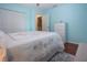 Charming bedroom with a full-size bed and white built-ins at 1623 Faxton Dr, Sun City Center, FL 33573
