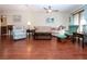 Relaxing living room with hardwood floors and comfortable furnishings at 1623 Faxton Dr, Sun City Center, FL 33573