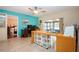 Home office with view into bedroom and kitchen at 1623 Faxton Dr, Sun City Center, FL 33573