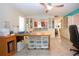 Bright and airy office space with ceiling fan at 1623 Faxton Dr, Sun City Center, FL 33573