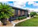 Private screened porch with lush landscaping at 1623 Faxton Dr, Sun City Center, FL 33573