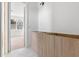 Modern bathroom with light wood cabinets and hexagonal tile at 1712 W Arch St, Tampa, FL 33607