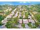 Aerial view of a waterfront community of villas at 24 Windrush Bay Dr, Tarpon Springs, FL 34689