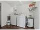 Laundry room with washer, dryer, and water heater at 5413 13Th S Ave, Gulfport, FL 33707