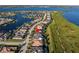 An aerial view of a waterfront home in a residential community at 5608 Tidewater Preserve Blvd, Bradenton, FL 34208