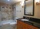 Bathroom with a large vanity, shower and bathtub at 6060 Shore S Blvd # 805, Gulfport, FL 33707