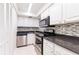 Updated kitchen, featuring stainless steel appliances at 6100 12Th S St # 219, St Petersburg, FL 33705