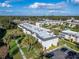 Aerial view of condo complex with pool and surrounding buildings at 716 Oakgrove Dr # 240, Brandon, FL 33510