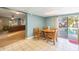 Kitchen nook with wood table and chairs, view of pool at 8254 40Th N Ave, St Petersburg, FL 33709