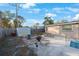 Spacious backyard with a patio, grill, and shed, perfect for outdoor entertaining at 8254 40Th N Ave, St Petersburg, FL 33709
