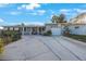 Single story home with carport and porch at 8254 40Th N Ave, St Petersburg, FL 33709