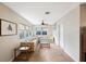 Cozy living area with corner sofa and large windows at 8254 40Th N Ave, St Petersburg, FL 33709