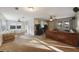 Open living area with two seating areas and large windows at 8254 40Th N Ave, St Petersburg, FL 33709