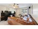 Spacious living room with large sectional sofa and carpet at 8254 40Th N Ave, St Petersburg, FL 33709