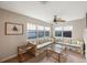 Living room with sectional sofa, coffee table, and large windows at 8254 40Th N Ave, St Petersburg, FL 33709