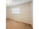 Spacious bedroom with ceiling fan and neutral carpeting at 8254 40Th N Ave, St Petersburg, FL 33709