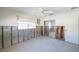 Unfinished bedroom with exposed walls, flooring, and mirrored closet at 855 115Th Ave, Treasure Island, FL 33706