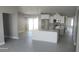 Modern kitchen featuring an island with bar seating and stainless steel appliances at 103 2Nd Ne Ave, Lutz, FL 33549