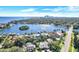 Wide aerial view of waterfront homes and city skyline at 105 Estado Ne Way, St Petersburg, FL 33704
