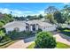 Aerial view of a beautiful house with a circular driveway at 105 Estado Ne Way, St Petersburg, FL 33704