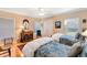 Well-lit bedroom with twin beds, hardwood floors, and blue bedding at 105 Estado Ne Way, St Petersburg, FL 33704