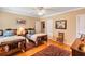 Charming bedroom with twin beds, hardwood floors, and a decorative rug at 105 Estado Ne Way, St Petersburg, FL 33704