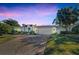 Stunning curb appeal with a beautifully landscaped front yard at 105 Estado Ne Way, St Petersburg, FL 33704