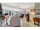 Living room with built-in bar and unique terrazzo floor at 105 Estado Ne Way, St Petersburg, FL 33704