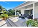 Relaxing patio with wicker furniture and a spacious deck at 105 Estado Ne Way, St Petersburg, FL 33704