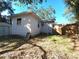 Backyard view showcasing a shed and house exterior at 1708 Preston S St, St Petersburg, FL 33712