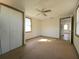 Bright bedroom with closet and view into kitchen at 1708 Preston S St, St Petersburg, FL 33712