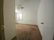 Simple bedroom with ceiling fan and neutral carpet at 1708 Preston S St, St Petersburg, FL 33712